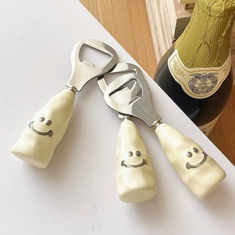 Cute smiley face beer bottle opener with a ceramic handle, stand-up design, creative stainless steel cap remover, bottle opener.