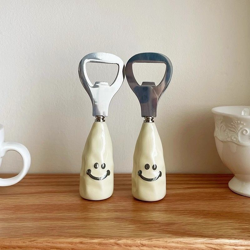 Cute smiley face beer bottle opener with a ceramic handle, stand-up design, creative stainless steel cap remover, bottle opener.