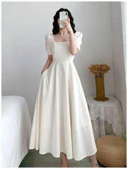 White Hepburn light mature style dress with puff sleeves square neck, waist, slimming temperament, over-the-knee long dress