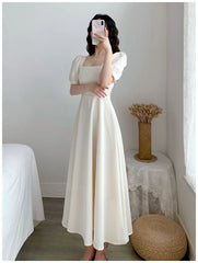 White Hepburn light mature style dress with puff sleeves square neck, waist, slimming temperament, over-the-knee long dress