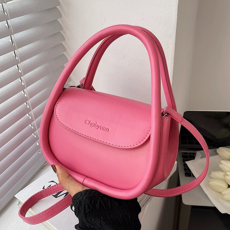 Versatile leather single shoulder pink portable crossbody saddle bag