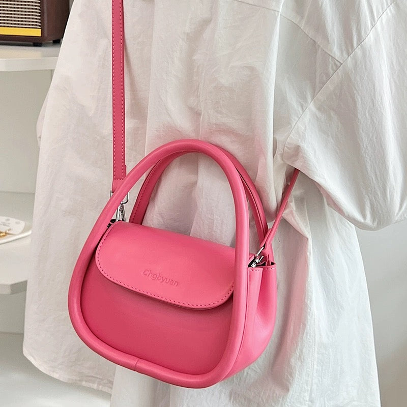 Versatile leather single shoulder pink portable crossbody saddle bag