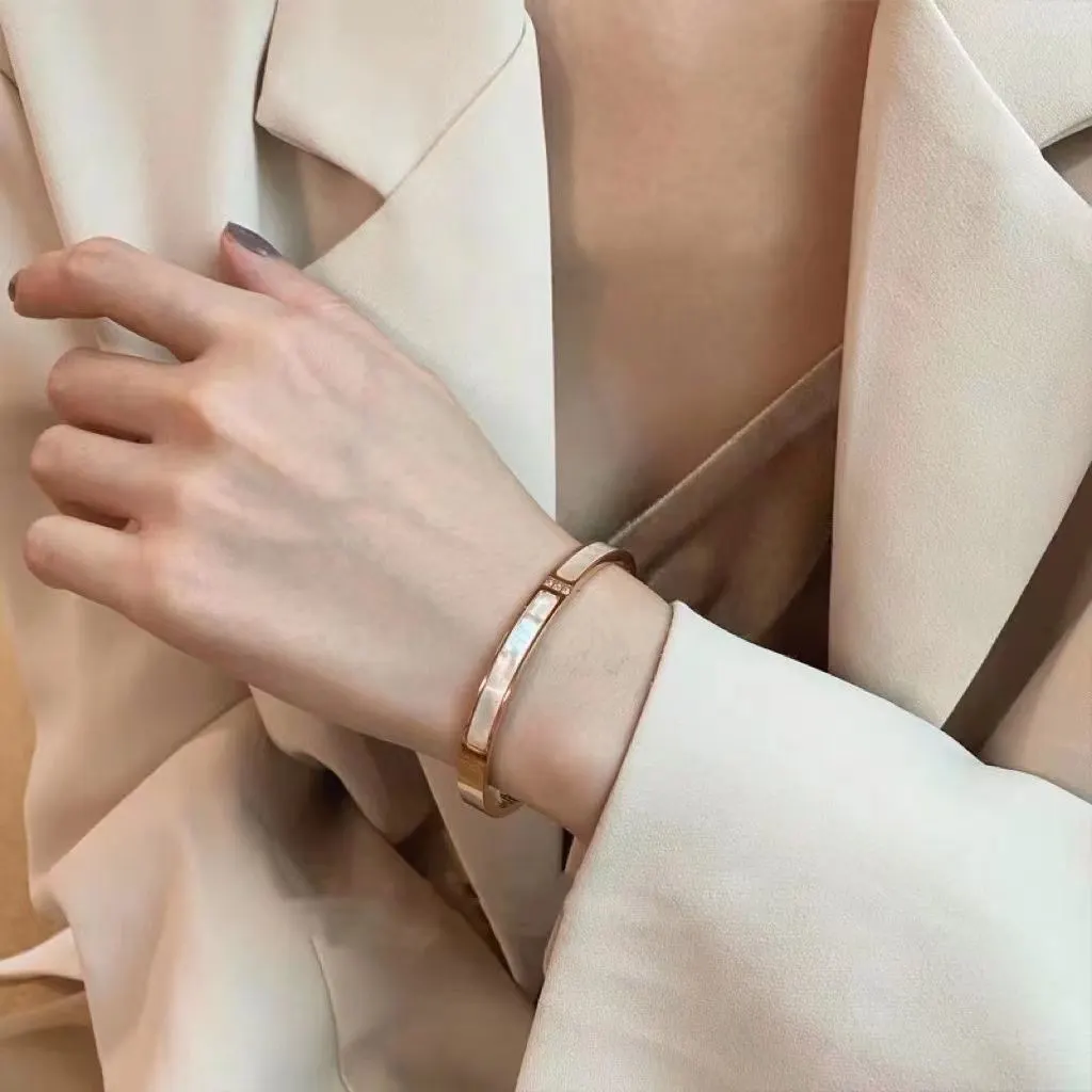 13374612984364486 Oval Titanium Steel Bracelet - White Mother-of-Pearl & Zircon Inlay - Image 1