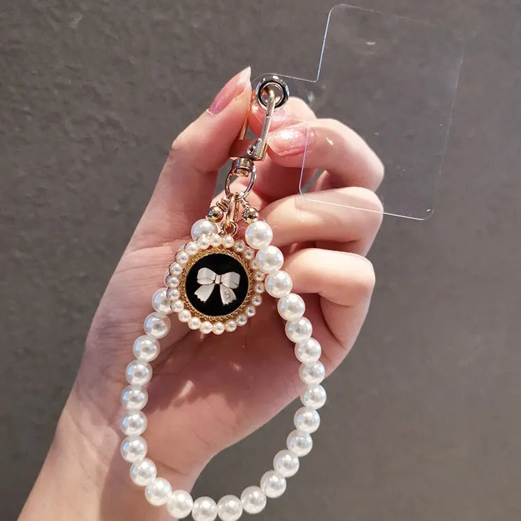 O1CN013SWbqP2JuoSAa5YxZ__2214085839482-0-cib Chic Pearl Wrist Strap - Image 1